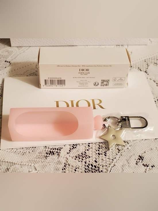 Dior Accessories - DIOR Pink lip oil holder Silicone Keyring with Silver Star Charm